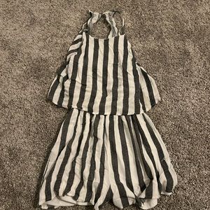 Romper with open back, pretty short, good condition
